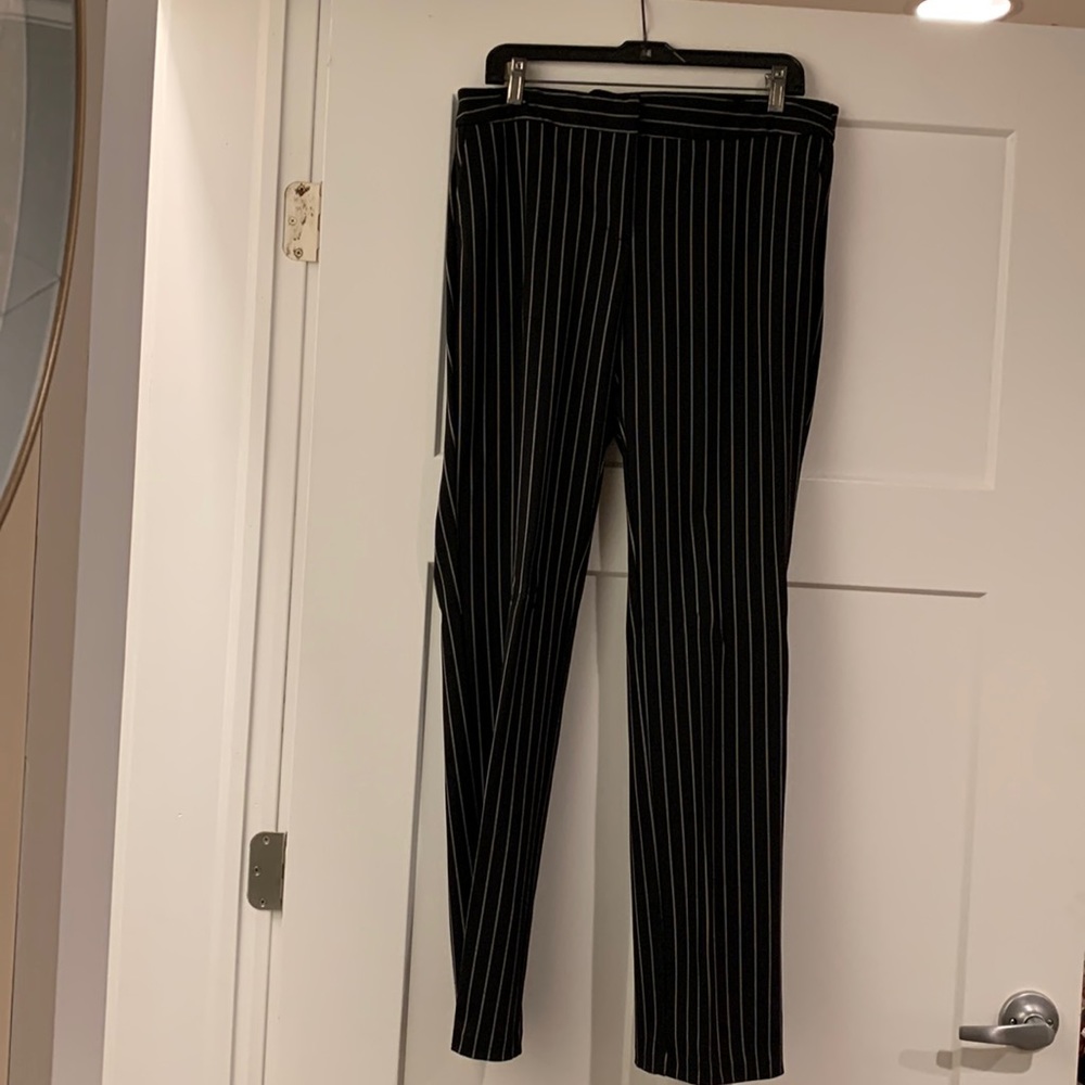 Black with white pin stripe ladies slacks. Size 10. By Willi Smith.